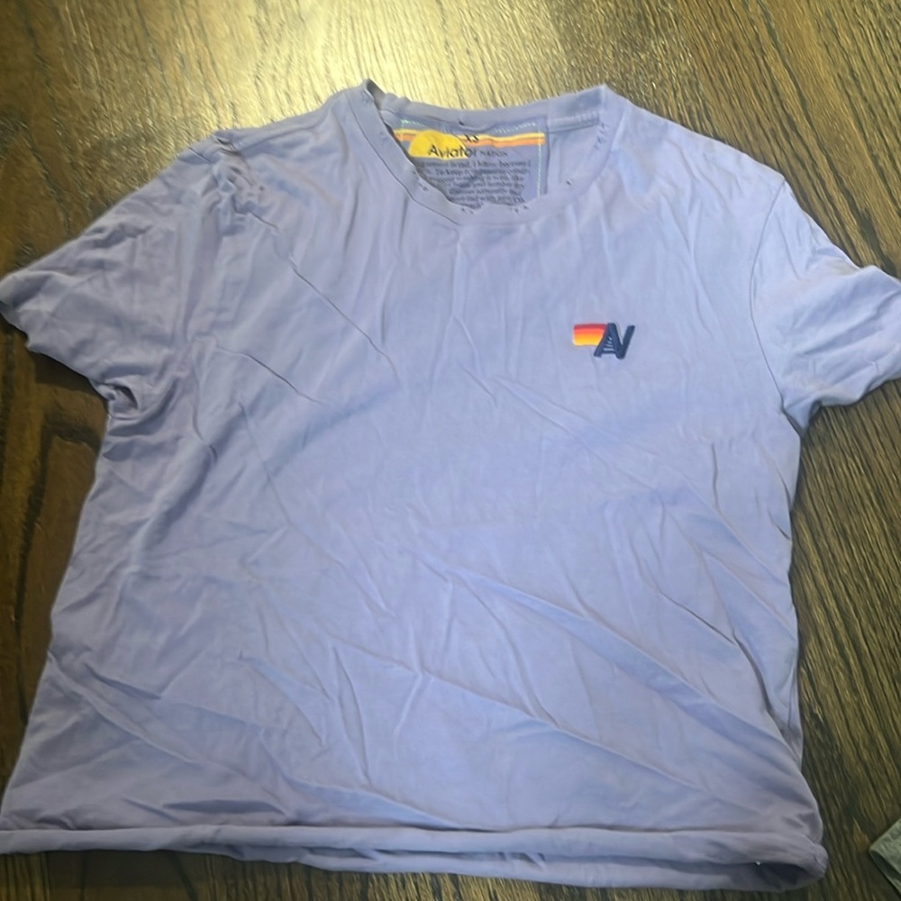 Aviator Nation T-Shirt. Distressed design on the neck